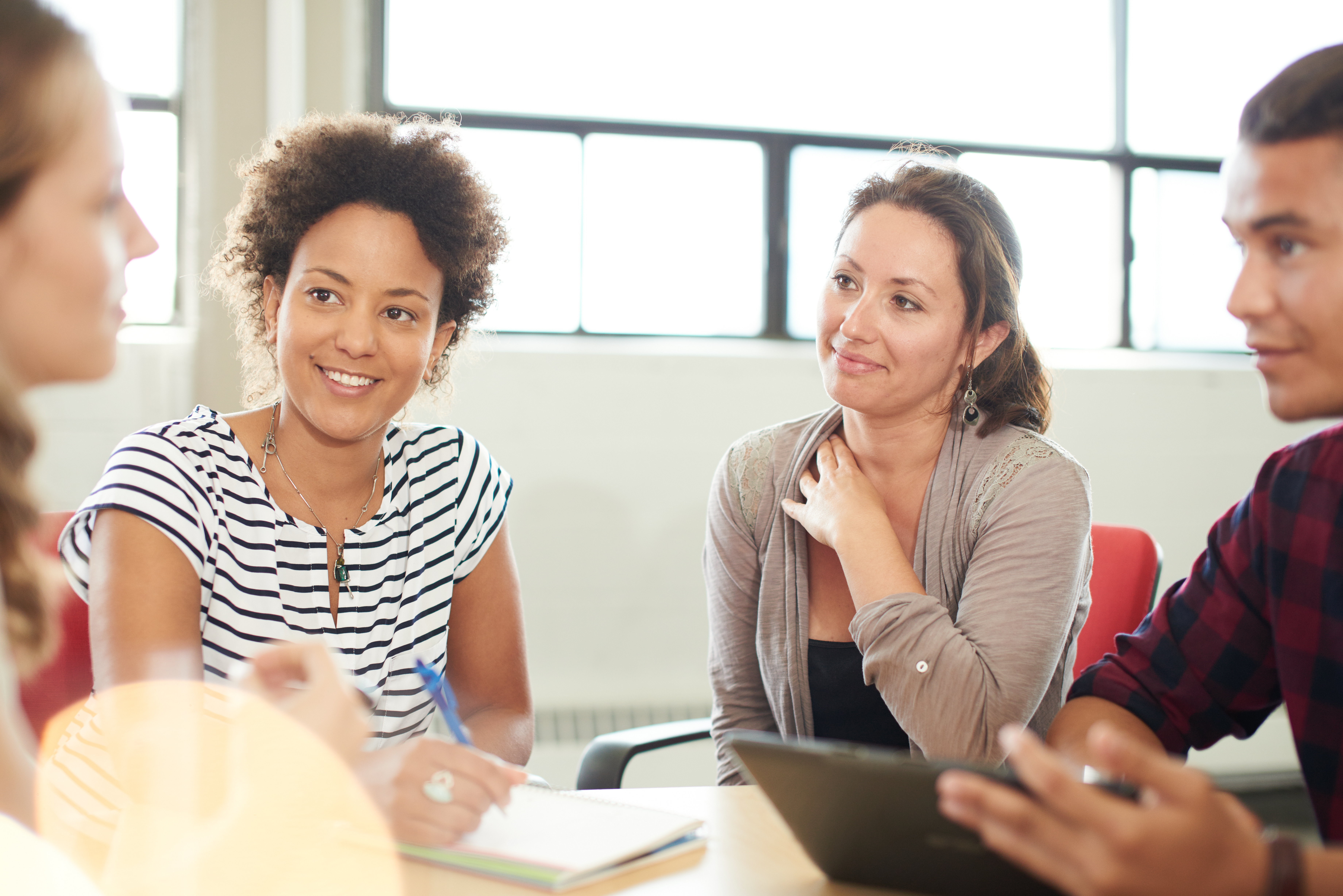 image of a group pf professionals talking